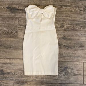 White mini dress with large bow
